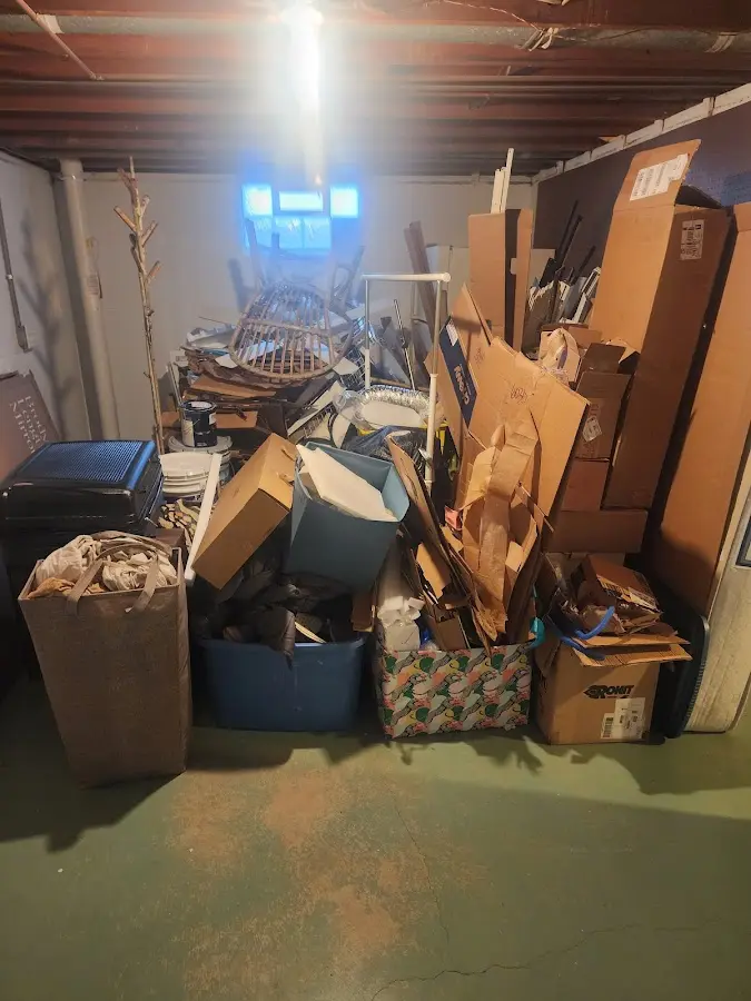 Roll-off dumpster container at job site for 2 Yard Dumpster Rental in Leander